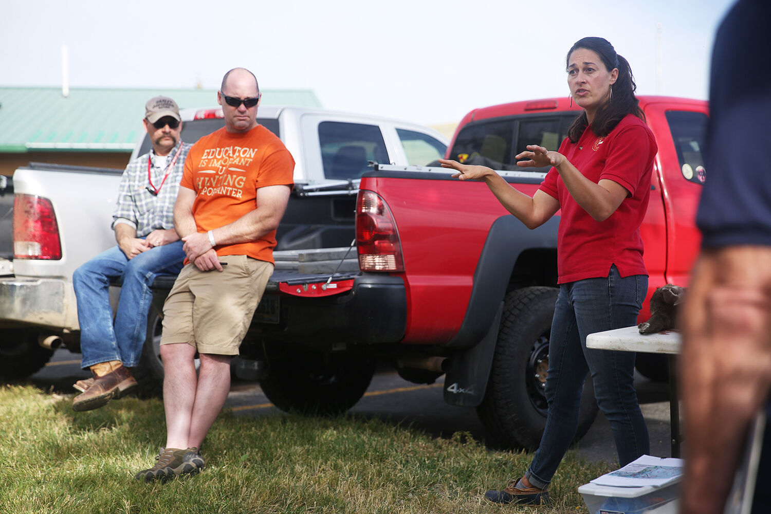 Cheyenne Stewart talks with BLM employees about Chronic Wasting Disease